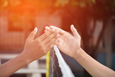 athletes shake hands after the competition.