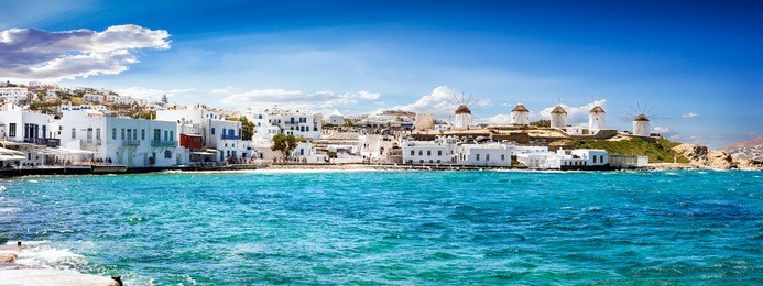 panoramic view to the famous windmills of mykonos, cyclades, greece