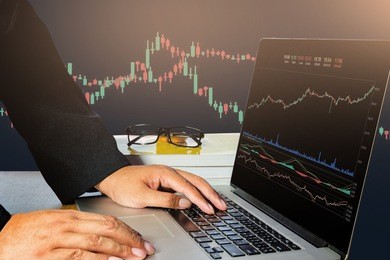 businessman on digital stock market financial positive indicator background. double exposure of growth graph futuristic economic currency chart investor data analysis technology money exchange concept