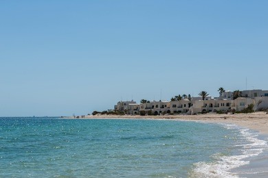 sandy beach of the resort sousse. tunisia, the port of el kantaoui. mediterranean sea.