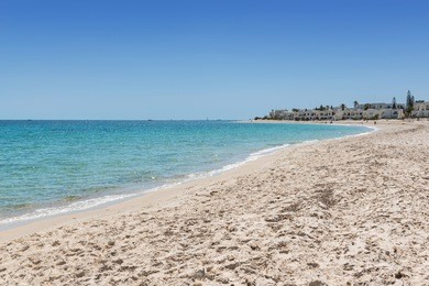 sandy beach of the resort sousse. tunisia, the port of el kantaoui. mediterranean sea.