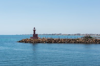 pier and lighthouse in the port of el kantaoui. resort sousse, tunisia.