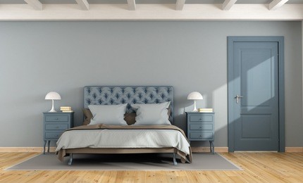blue master bedroom with double bed,nightstand and closed door - 3d rendering