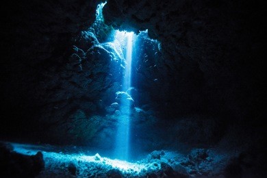 rays of sunlight into the underwater cave
