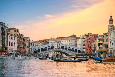 rialto bridge in venice, italy at twilight