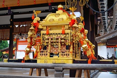 the mikoshi--a portable shrine--for yasaka jinja is on display as a part of the gion festival in kyoto, japan.