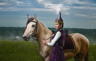 a girl in a national kazakh dress