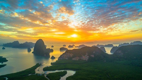 aerial photography sunrise at samed nang she viewpoint in phang nga gulf.a lot of tourists come for watching scenic view the sun shine above a group of islands in phang nga gulf