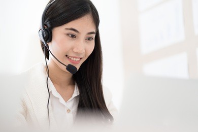 asian young woman working in call centre