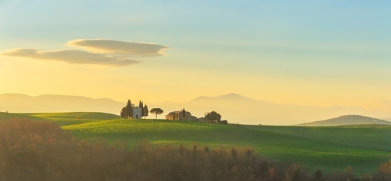 italian green fields at sunrise
