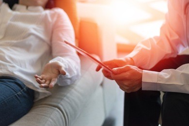 healthcare technology concept of professional psychologist doctor consult in psychotherapy session or counsel diagnosis health with tablet.