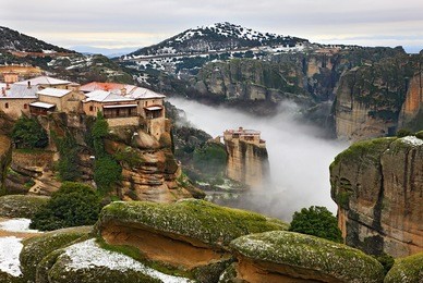 meteora monasteries in fog. varlaam and roussanou monasteries