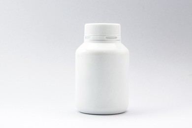 plastic bottle white on the white background. using wallpaper for package work photo and isolated image.