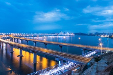 illuminated xinghai bay cross-sea bridge of dalian,china.