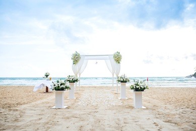 romantic wedding setting on the beach.