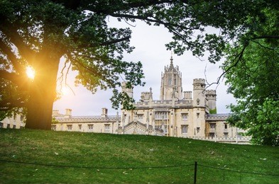 st john's college in the university of cambridge, england. the college was founded by lady margaret beaufort.this place have traditional architecture  with sunlight near the river cam.