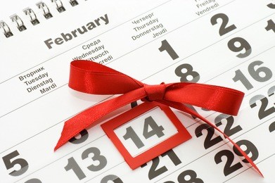 sheet of wall calendar with red mark on 14 february - valentines day