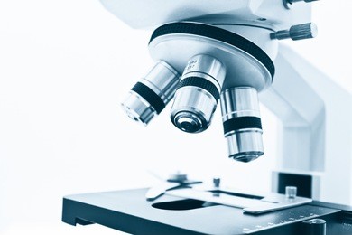 objective lens of microscope isolated on the white background