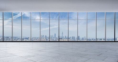 panoramic skyline and buildings from glass window
