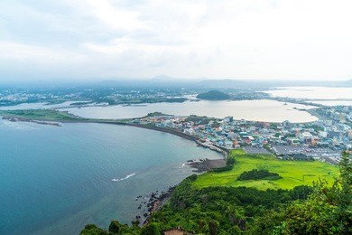 jeju city skyline view from seongsan ilchulbong, jeju island, south korea