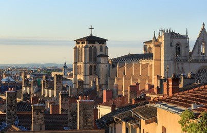 rooftops, chimneys and cathedral st. jean baptiste in vieux lyon, the old town of lyon. france.