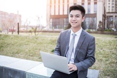 businessman use laptop at outdoor