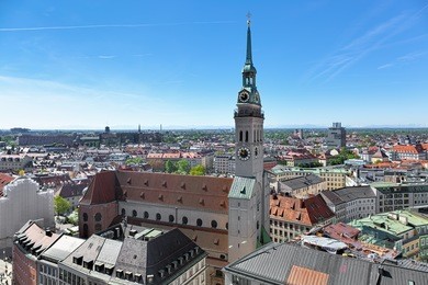 munich, germany. st. peter's church (alter peter) on the background of southern part of the city. view from the tower of new town hall. 