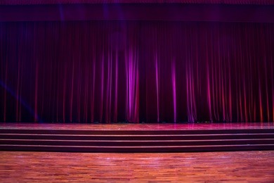 stage wood with ladder and red curtains in a theater.