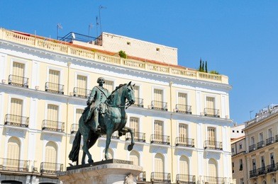 equestrian statue in  puerta del sol square in madrid, spain