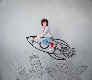 portrait of young child pretend to be businessman. kid playing at home. success, idea, and creative concept. copy space for your text