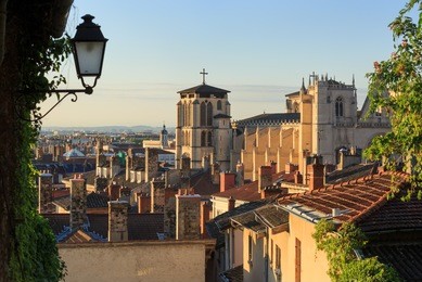 lantern, rooftops and cathedral st. jean baptiste in vieux lyon, the old town of lyon. france.
