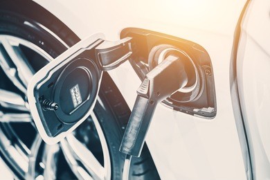 fillup electricity charge battery power electric car. future of ecocar clean energy.