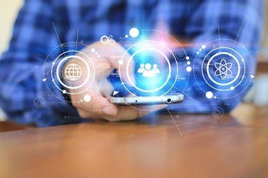 hand touch screen smart phone, icons interface on screen, social media, connect to the future concept.