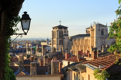 lantern and cathedral st. jean baptiste in vieux lyon, the old town of lyon, france. focus on lantern.