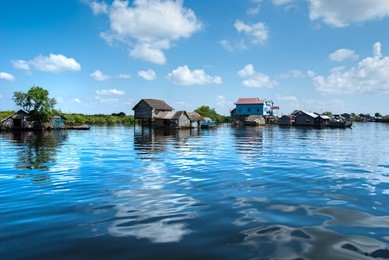 floating house and  houseboat on the tonle sap lake, between battambang and siem reap. cambodia.