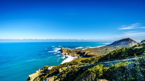 rugged rocks and steep cliffs of the cape of good hope on the atlantic ocean side of the cape peninsula in south africa