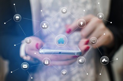 girl hand holding phone surrounded with home remote control icons