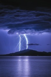 two lightning, heavy thunderstorm at bukhtarma reservoir, eastern kazakhstan