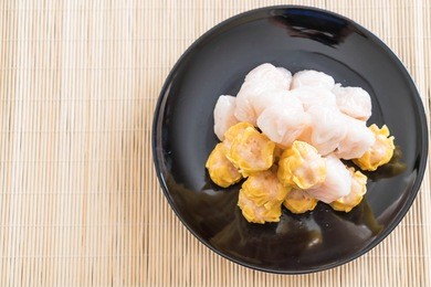 stream shrimp dumplings on table