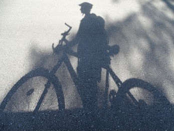 cyclist - shadow
here is a shadow of a cyclist on an asphalt road.