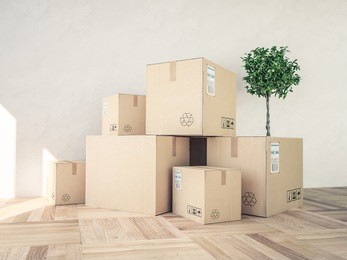 3d rendering, moving boxes stacked in empty room
