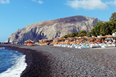 beach in kamari town on santorini island, greece