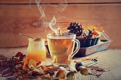 tea with honey and spices, concept of autumn postcard, effect of a couple
