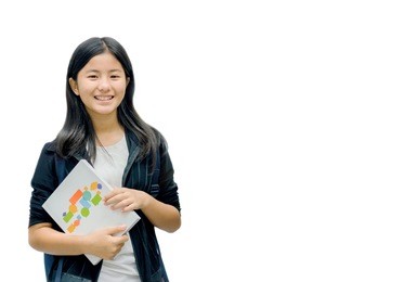teenager asian student girl holding book on isolated background