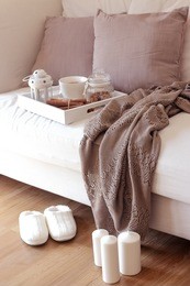 cozy autumn. home cosiness. knitted plaid, hot tea, biscuits. warm winter.