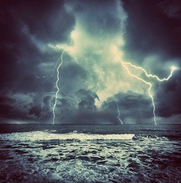 dark ocean storm with lgihting and waves at night