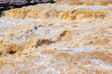 hukou waterfall-the biggest yellow waterfall in china. it located in the middle reaches of the yellow river. taken on the jixian county, shanxi, china. 