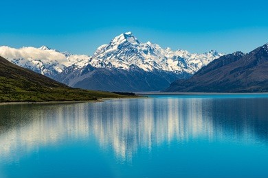 mount cook landscape reflection on lake pukaki, the highest mountain in new zealand and popular travel destination.