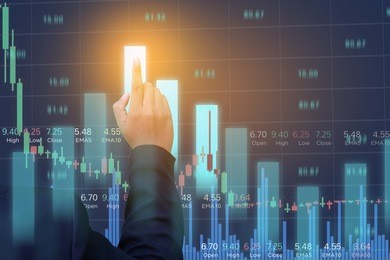 businessman on digital stock market financial positive indicator background. double exposure of growth graph futuristic chart currency. investor wall street technology. economic money exchange concept