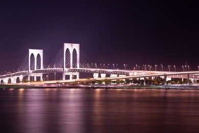 sai van bridge in macau at night